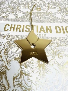 Christian Dior Gold Tone Metal Star with String - Picture 1 of 4