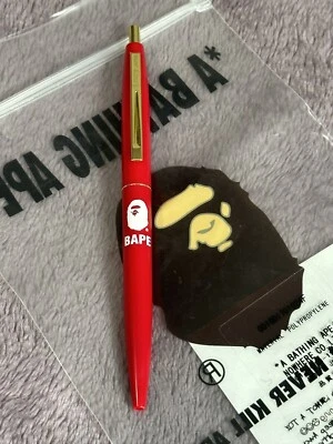 Pluma roja A BATHING APE Goods CABEZA DE MONO Japón 1F70182121 totalmente nueva Foto 1 de 4