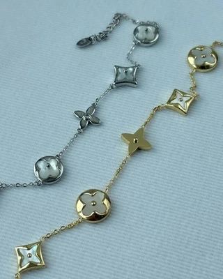 Gold & Silver Blossom Charm Bracelet , mother of pearl clover , Adjustable jewel - Image 1 of 4