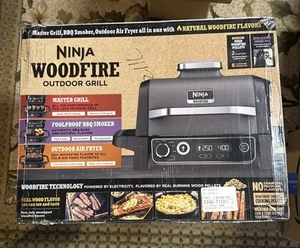 Nuevo Ninja Woodfire Parrilla Eléctrica Exterior Barbacoa Fumador Freidora de Aire Todo en Uno - Imagen 1 de 2