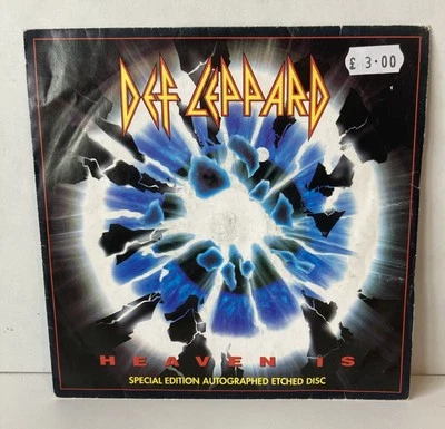 DEF LEPPARD Heaven Is Autographed Etched 7" Vinyl Special Edition Play Tested - Image 1 of 4