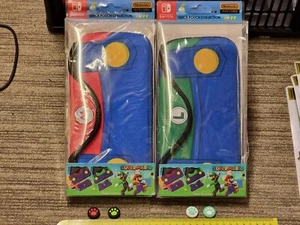 2 NINTENDO SWITCH CONSOLE CARRY CASE QUICK POUCH Mario Luigi + 4 JOYCON GRIP NEW - Picture 1 of 2