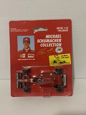 UT MODELS FORMULA 1 FERRARI MICHAEL SCHUMACHER WORLD CHAMPION 94 & 95 1/43 SCALE - Image 1 of 2