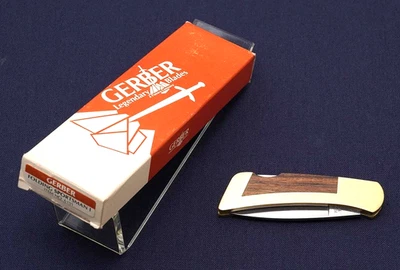 Navaja de bolsillo GERBER 6101 FS-ISportsman1 llama de latón con incrustación de madera dura tropical Foto 1 de 4