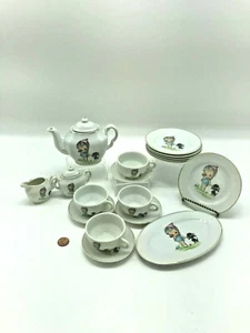 Juego de té de porcelana FAO Schwarz caniche negro ojos grandes niña 20 piezas Japón fingir - Imagen 1 de 12