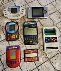 Lot of 7 Hand Held Video Games