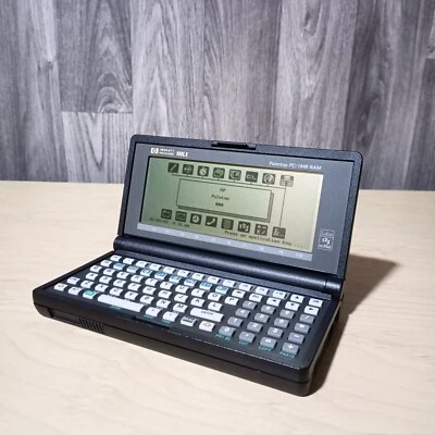 HP Hewlett Packard 100LX Rare Vintage Palmtop Pocket PC Computer + 4MB PC Card - Image 1 of 4