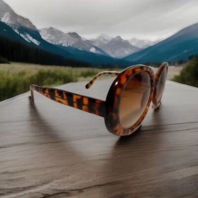 Gafas de sol ovaladas vintage Steve Madden para mujer marrón con estampado de leopardo, salir con estilo Foto 1 de 4