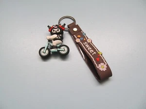 Hello Kitty Kuromi (Riding Bike) Pendant Key Chain (NEW) - Picture 1 of 2