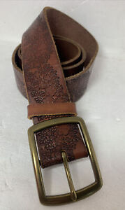 Lucky Brand  Tooled Stamped Leather Belt floral brass Buckle. Size Med 1.5” wide