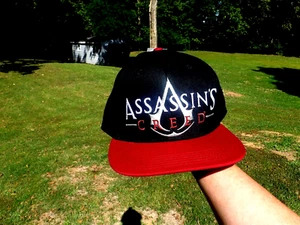 NEW W/ TAGS! VINTAGE ASSASSINS CREED EMBROIDERED FRONT & BACK SNAP BACK CAP HAT! - Picture 1 of 13