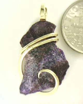 16.91ct Natural Deep Purple Sugilite Shard in 14kt Gold Wire Wrap Pendant - Image 1 of 4