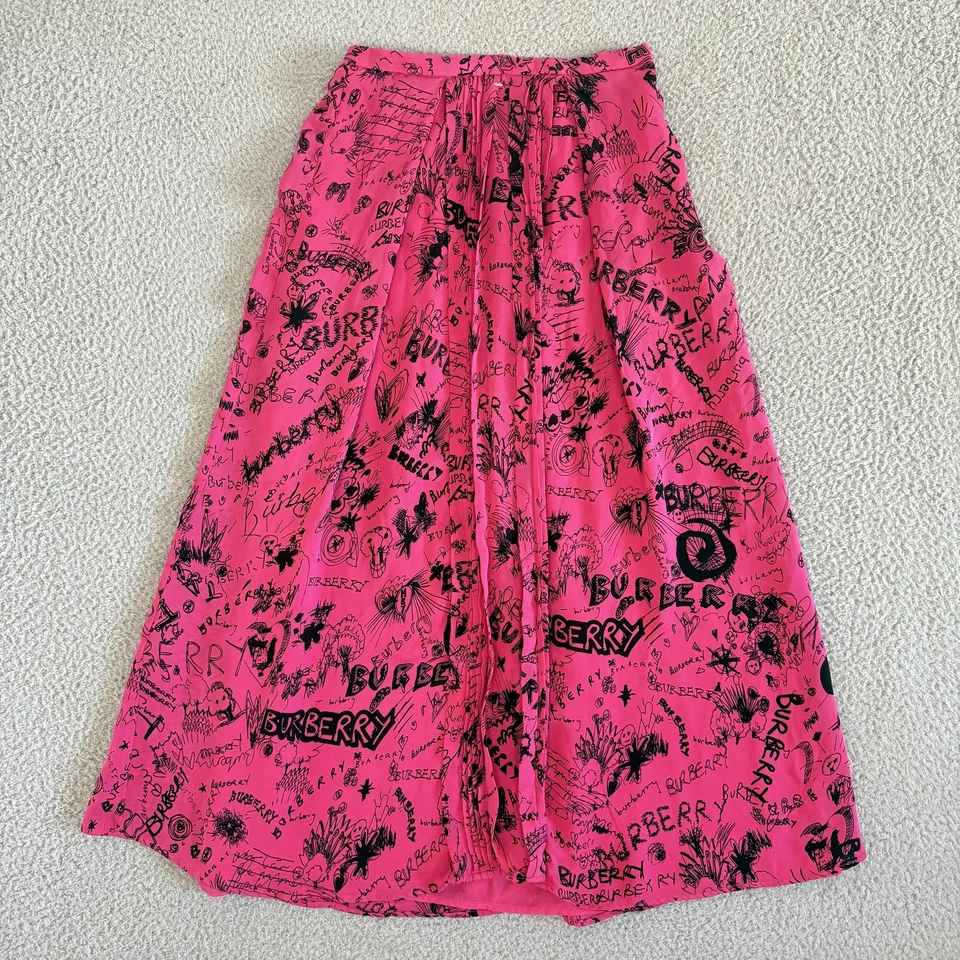 Falda Burberry Mujer Grande Rosa Seda Garabato Graffiti Logo Plisada Midi Línea A Foto 1 de 4