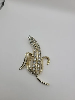 Broche de diamantes de imitación vintage Sarah Coventry tono dorado floral prendedor mediados de siglo Foto 1 de 4