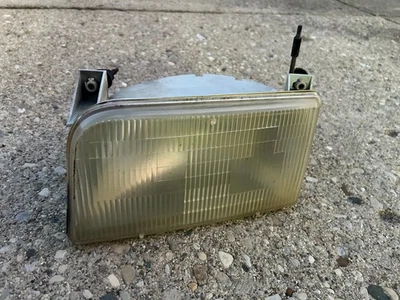 FARO DELANTERO IZQUIERDO FORD F150 F250 F350 92-1996 USADO CON AJUSTADOR Foto 1 de 4