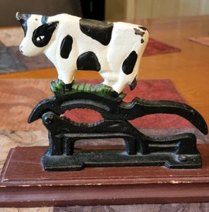 Vintage Cast Iron Nutcracker On Wood Base - Black and WHITE COW - Picture 1 of 6