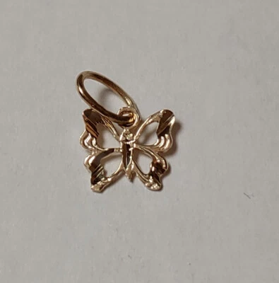  Nuevo colgante con dije de mariposa pequeña de oro amarillo de 14k  Foto 1 de 4