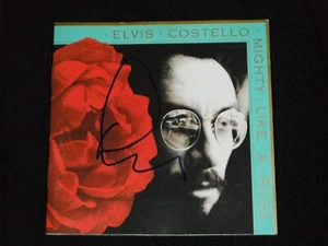 ELVIS COSTELLO SIGNED MIGHTY LIKE A ROSE CD COVER - Picture 1 of 1