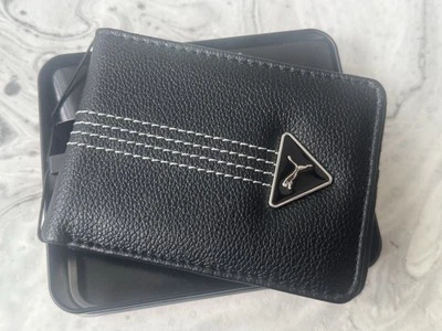 Cartera Puma Hombre Doble Pliegue Negro Guijarro Imitación Cuero Logo Plateado Foto 1 de 4