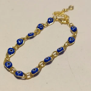 Goldfarbenes blaues Evil Eye Gliederarmband verstellbar Boho - Bild 1 von 5