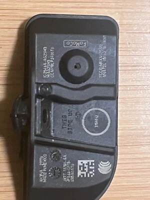 FORD ESCAPE TPMS TIRE PRESSURE MONITORING SYSTEM SENSOR OEM JX7T-1A180 AA - Image 1 of 3