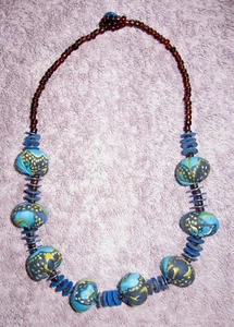 Collana di perle avvolte in tessuto; dischi; piccole perle rotonde; blu; goccia 8" - Foto 1 di 11