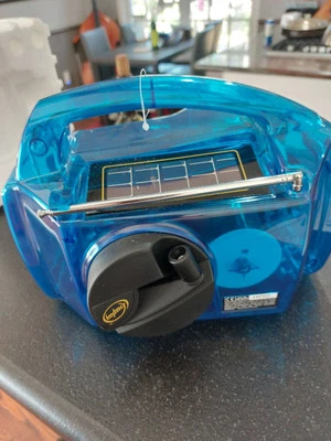 Freeplay FPR2 Self Powered AM/FM Radio Solar & Crank Solar Clear Blue Box Papers - Image 1 of 4