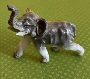 Estatuilla de elefante vintage Kioto Japón miniatura hueso China tronco de la suerte gris - Imagen 1 de 6