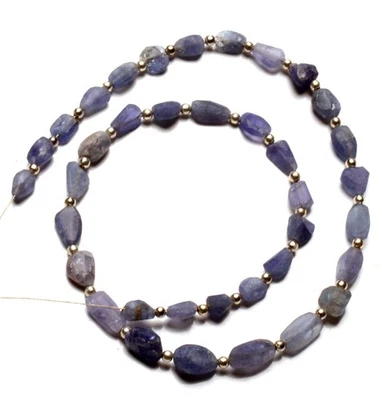 Piedras preciosas de tanzanita natural tamaño de 6 a 9 mm cuentas sin pulir en forma de pepita hebra de 13" Foto 1 de 4