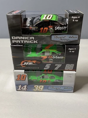 1/64 Danica Patrick #7 & #10 GoDaddy.com Diecast Lot (3) Action Boxed 2011-12-15 - Image 1 of 4