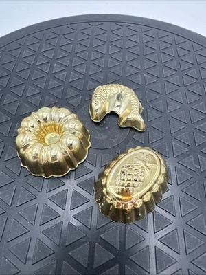 Juego de 3 imanes vintage de molde de gelatina tono cobre Arjon 1977 Foto 1 de 3