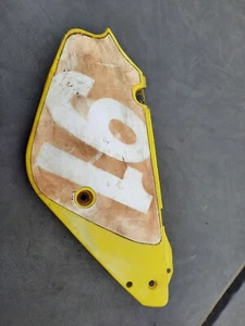 SUZUKI- 47111-03B60 RH SIDE COVER- 00-16 RM 80-85 - OEM - Picture 1 of 8