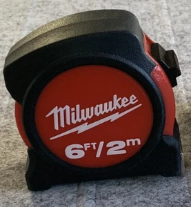Milwaukee Nastro Misuratore 2m / 6ft 13mm Larghezza Retrattile Compatto Lama Metallo - Foto 1 di 4