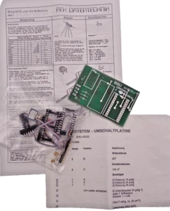 COMMODORE 64/128 -- BETRIEBSSYSTEM UMSCHALTPLATINE (REX  9517/9527 - BAUSATZ) - Afbeelding 1 van 3