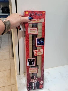 HARRY POTTER DELUXE WAND LIGHTS UP" 3 MAGICAL MOVIE SOUNDS! MOTION ACTIVATED NIB - Picture 1 of 11