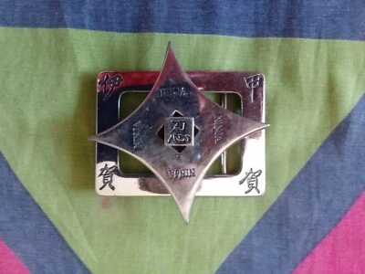 FIBBIA PER CINTURE IN METALLO CON STELLA NINJA ESTRAIBILE - Immagine 1 di 2