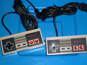 2 ORIGINAL AUTHENTIC NINTENDO BRAND OFFICIAL VINTAGE  NES CONTROLLER - Picture 1 of 4