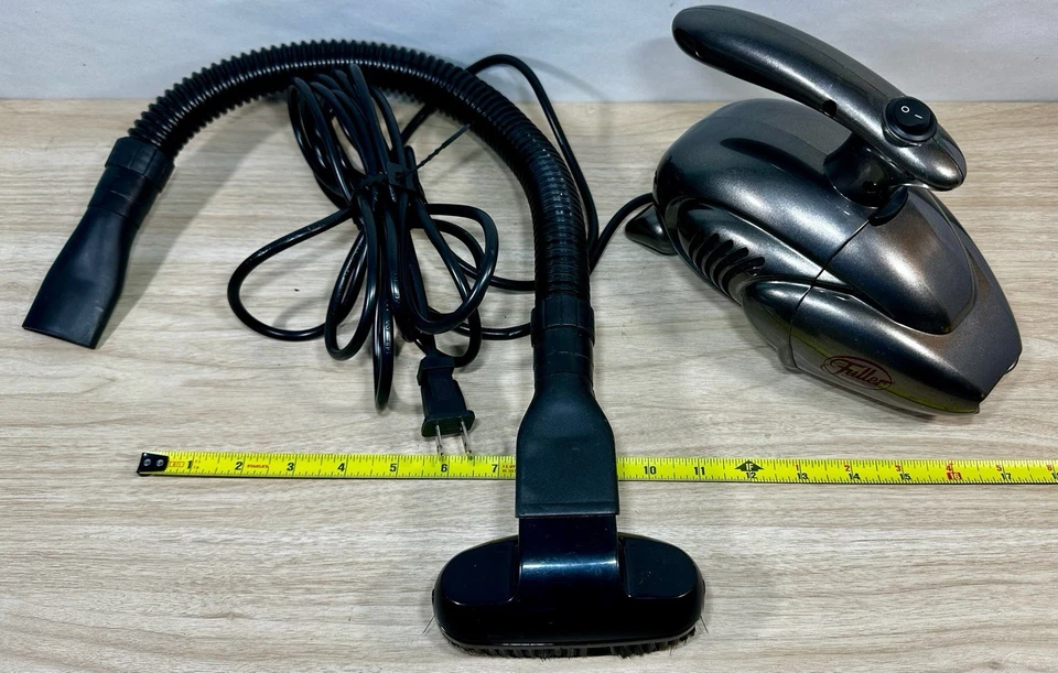 Micro aspiradora de mano Fuller Brush Company modelo FBMV negra metálica (G) Foto 1 de 4