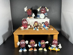 Figurine California Raisins vintage anni 80 90 - 9 batteria tutte diverse chitarra - Foto 1 di 8