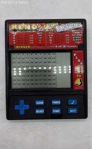 Vintage Radica Keno Model 1480 Electronic Handheld Game Powers On - Picture 1 of 5