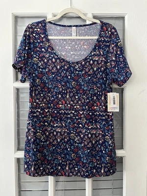 NUEVO CON ETIQUETAS Lularoe Mujer’s L Clásica Camiseta Azul Estampado Floral Manga Corta Foto 1 de 4