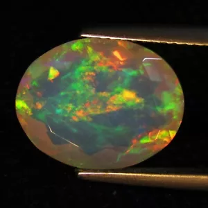 Pierre précieuse ovale ovale 4,48 cts opale blanche naturelle frappante 14,3 x 11,2 x 7 mm d'Éthiopie - Photo 1 sur 4
