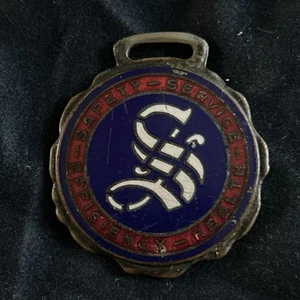 Antiguo Reloj Esmaltado 'S' Llavero Miembro del Comité para Prevenir Accidentes e Incendios - Imagen 1 de 3