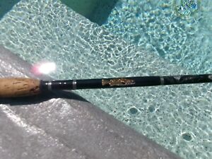 New, Custom 6'9", 8-15 lb. spinning rod w/hand woven trout