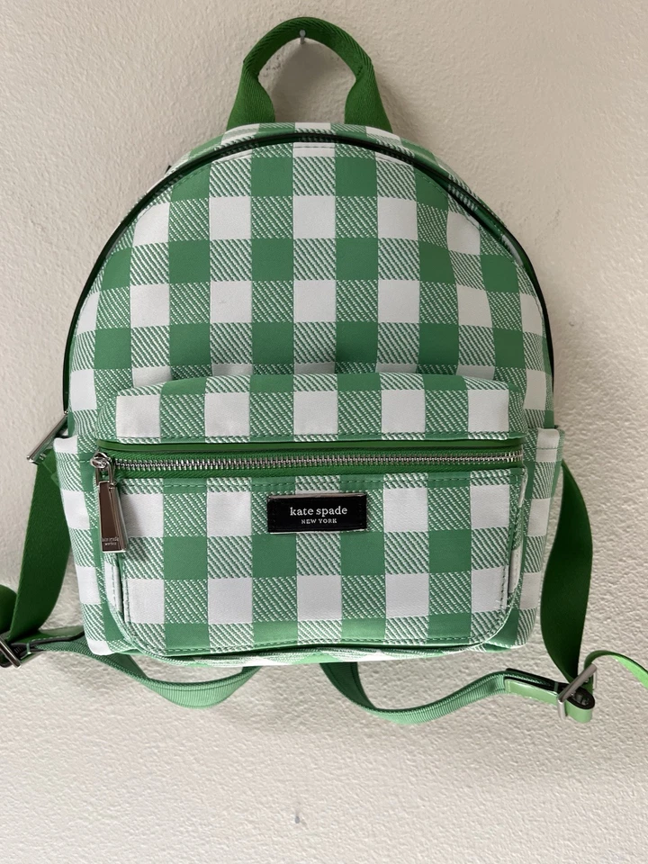 Bolso de mano Kate Spade estampado de guinga, carcasa y forro de poliéster. Org $ 278 Foto 1 de 4