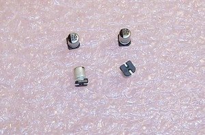 QTY (100) 2.2uf 63V 4x5.7mm SMD ELECTROLYTIC CAPACITORS ECEV1JA2R2R PANASONIC - Picture 1 of 4