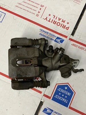 Pinza de freno trasera izquierda usada 2004-2008 OEM Acura TSX CL9 K24 K24A Foto 1 de 4