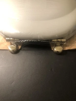 Asiento de inodoro alargado KOHLER 4615-AF-95 Revival GRIS HIELO CON BISAGRAS DORADAS FRANCESAS Foto 1 de 4