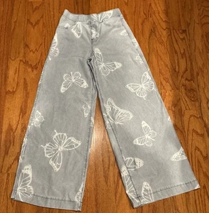 Pantalones de mezclilla H&M acampanados azul lavado claro talla 14 estampado mariposa para niñas - Imagen 1 de 7