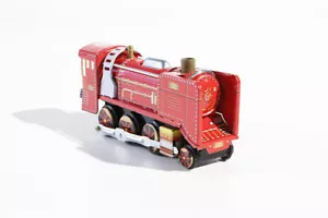 Juguete de hojalata con motor de tren rojo - Imagen 1 de 3